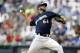 MILWAUKEE, WI - AUGUST 07: Mike Fiers #64 of the Milwaukee Brewers pitches against the Cincinnati Reds during the game at Miller Park on August 07, 2012 in Milwaukee, Wisconsin. (Photo by Mike McGinnis/Getty Images)