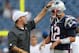 FOXBORO, MA - AUGUST 9: Tom Brady #12 of the New England Patriots shares a moment with Offensive Coordinator Josh McDaniels before a preseason game with New Orleans Saints at Gillette Stadium on August 9, 2012 in Foxboro, Massachusetts. (Photo by Jim Rogash/Getty Images)