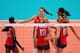LONDON, ENGLAND - AUGUST 09: Logan Tom #15, Destinee Hooker #19, Christa Harmotto #13, Jordan Larson #10 and Foluke Akinradewo #16 of United States celebrate after a point against Korea during the Women's Volleyball semifinal match on Day 13 of the London 2012 Olympics Games at Earls Court on August 9, 2012 in London, England. (Photo by Elsa/Getty Images)