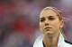 LONDON, ENGLAND - AUGUST 09: Alex Morgan #13 of United States looks on during the national anthem before taking on Japan during the Women's Football gold medal match on Day 13 of the London 2012 Olympic Games at Wembley Stadium on August 9, 2012 in London, England. (Photo by Julian Finney/Getty Images)