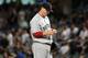 NEW YORK, NY - SEPTEMBER 25: John Lackey #41 of the Boston Red Sox reacts after allowing a two-run double to Mark Teixeira #25 of the New York Yankees (not pictured) during the bottom of the first inning on September 25, 2011 at Yankee Stadium in the Bronx borough of New York City. (Photo by Christopher Pasatieri/Getty Images)