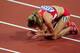 LONDON, ENGLAND - AUGUST 10: Morgan Uceny of the United States reacts after falling during the Women's 1500m Final on Day 14 of the London 2012 Olympic Games at Olympic Stadium on August 10, 2012 in London, England. (Photo by Stu Forster/Getty Images)