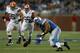 DETROIT, MI - AUGUST 10: Ndamukong Suh #90 of the Detroit Lions chases the loose ball after Brandon Weeden #3 of the Cleveland Browns fumbled the ball during the first quarter of the game at Ford Field on August 10, 2012 in Detroit, Michigan. (Photo by Leon Halip/Getty Images)