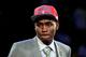 NEWARK, NJ - JUNE 28: Moe Harkless of St. John's Red Storm walks on stage after he was selected number fifteen overall by the Philadelphia 76ers during the first round of the 2012 NBA Draft at Prudential Center on June 28, 2012 in Newark, New Jersey. NOTE TO USER: User expressly acknowledges and agrees that, by downloading and/or using this Photograph, user is consenting to the terms and conditions of the Getty Images License Agreement. (Photo by Elsa/Getty Images)