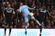 MANCHESTER, ENGLAND - MARCH 21: Carlos Tevez of Manchester City battles with John Obi Mikel of Chelsea during the Barclays Premier League match between Manchester City and Chelsea at the Etihad Stadium on March 21, 2012 in Manchester, England. (Photo by Alex Livesey/Getty Images)