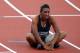 LONDON, ENGLAND - AUGUST 05: Ghfran Almouhamad of Syrian Arab Republic sits after competing in the Women's 400m Hurdles Round 1 Heats on Day 9 of the London 2012 Olympic Games at the Olympic Stadium on August 5, 2012 in London, England. (Photo by Alex Livesey/Getty Images)
