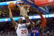 PHILADELPHIA, PA - MARCH 21: Jodie Meeks #20 of the Philadelphia 76ers goes up for a shot against Amare Stoudemire #1 of the New York Knicks at the Wells Fargo Center on March 21, 2012 in Philadelphia, Pennsylvania. The Knicks won 82-79. NOTE TO USER: User expressly acknowledges and agrees that, by downloading and or using this photograph, User is consenting to the terms and conditions of the Getty Images License Agreement. (Photo by Drew Hallowell/Getty Images)