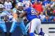 Dec 4, 2011; Orchard Park, NY, USA; Tennessee Titans guard Jake Scott (73) blocks Buffalo Bills defensive end Marcell Dareus (99) during the second quarter at Ralph Wilson Stadium. Titans beat the Bills 23-17. Mandatory Credit: Kevin Hoffman-US PRESSWIRE