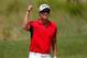KIAWAH ISLAND, SC - AUGUST 11: Adam Scott of Australia reacts after chipping in on the fifth hole during Round Three of the 94th PGA Championship at the Ocean Course on August 11, 2012 in Kiawah Island, South Carolina. (Photo by Jonathan Ferrey/Getty Images)