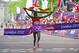 LONDON, ENGLAND - AUGUST 12: Stephen Kiprotich of Uganda celebrates as he approaches the line to win gold in the Men's Marathon on Day 16 of the London 2012 Olympic Games at The Mall on August 12, 2012 in London, England. (Photo by Stu Forster/Getty Images)