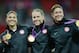 LONDON, ENGLAND - AUGUST 09: (L-R) Hope Solo #1, Lauren Cheney #12 and Abby Wambach #14 of the United States pose with the the gold medal after defeating Japan by a score of 2-1 to win the Women's Football gold medal match on Day 13 of the London 2012 Olympic Games at Wembley Stadium on August 9, 2012 in London, England. (Photo by Michael Regan/Getty Images)