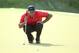 KIAWAH ISLAND, SC - AUGUST 12: Tiger Woods of the United States lines up a putt on the 17th green during Round Three of the 94th PGA Championship at the Ocean Course on August 12, 2012 in Kiawah Island, South Carolina. (Photo by Andrew Redington/Getty Images)
