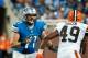 Aug 10, 2012; Detroit, MI, USA; Detroit Lions offensive tackle Riley Reiff (71) and Cleveland Browns running back William Green (49) during the second half of a preseason game at Ford Field. Cleveland defeated Detroit 19-17. Mandatory Credit: Tim Fuller-US PRESSWIRE