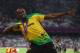 LONDON, ENGLAND - AUGUST 09: Gold medalist Usain Bolt of Jamaica celebrates during the medal ceremony for the Men's 200m on Day 13 of the London 2012 Olympic Games at Olympic Stadium on August 9, 2012 in London, England. (Photo by Cameron Spencer/Getty Images)