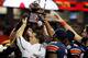 ATLANTA, GA - DECEMBER 31: Head coach Gene Chizik of the Auburn Tigers celebrates with the trophy after their 43-24 win over the Virginia Cavaliers during the 2011 Chick Fil-A Bowl at Georgia Dome on December 31, 2011 in Atlanta, Georgia. (Photo by Kevin C. Cox/Getty Images)