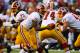 ORCHARD PARK, NY - AUGUST 09: Robert Griffin III #10 of the Washington Redskins hands off to Chris Cooley #47 of the Washington Redskins at Ralph Wilson Stadium on August 9, 2012 in Orchard Park, New York. (Photo by Rick Stewart/Getty Images)