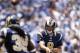 Rams quarterback Sam Bradford completes a short pass to running back Steven Jackson (39).