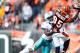 CINCINNATI - OCTOBER 31: Vontae Davis #21 of the Miami Dolphins defends Chad Ochocinco #85 of the Cincinnati Bengals as he catches a pass during the NFL game at Paul Brown Stadium on October 31, 2010 in Cincinnati, Ohio. (Photo by Andy Lyons/Getty Images)