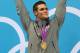 LONDON, ENGLAND - AUGUST 11: Gold medallist David Boudia of the United States celebrates on the podium during the medal ceremony for the Men's 10m Platform Diving Final on Day 15 of the London 2012 Olympic Games at the Aquatics Centre on August 11, 2012 in London, England. (Photo by Clive Rose/Getty Images)