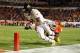 MIAMI GARDENS, FL - JANUARY 04: Stedman Bailey #3 of the West Virginia Mountaineers scores a 3-yard touchdown reception in the third quarter against Bashaud Breeland #17 of the Clemson Tigers during the Discover Orange Bowl at Sun Life Stadium on January 4, 2012 in Miami Gardens, Florida. (Photo by Mike Ehrmann/Getty Images)