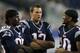 FOXBORO, MA - AUGUST 9: Brandon Lloyd, Tom Brady #12, and Jabar Gaffney #10 of the New England Patriots chat from the sideline in the second half during a game against the New Orleans Saints at Gillette Stadium on August 9, 2012 in Foxboro, Massachusetts. (Photo by Jim Rogash/Getty Images)