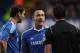 LONDON, ENGLAND - FEBRUARY 06: Branislav Ivanovic and John Terry of Chelsea talk to referee Andre Marriner during the Barclays Premier League match between Chelsea and Liverpool at Stamford Bridge on February 6, 2011 in London, England. (Photo by Scott Heavey/Getty Images)