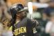 HOUSTON TX - JULY 27: Andrew McCutchen #22 of the Pittsburgh Pirates doubles in the fourth inning against the Houston Astros at Minute Maid Park on July 27, 2012 in Houston, Texas. (Photo by Bob Levey/Getty Images)