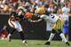CLEVELAND, OH - OCTOBER 25: Al Harris #31 of the Green Bay Packers tackles Mohamed Massaquoi #11 of the Cleveland Browns at Cleveland Browns Stadium on October 25, 2009 in Cleveland, Ohio. (Photo by Matt Sullivan/Getty Images)