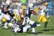 Aug 9, 2012; San Diego, CA, USA; San Diego Chargers running back Ryan Mathews (24) runs the ball as Green Bay Packers linebacker A.J. Hawk (50) persues the play during the first quarter at Qualcomm Stadium. Mandatory Credit: Jake Roth-US PRESSWIRE