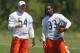 LAKE FOREST, IL - JUNE 12: (L-R) Johnny Knox #13, Brian Urlacher #54 and Charles Tillman #33 of the Chicago Bears chat during a minicamp practice at Halas Hall on June 12, 2012 in Lake Forest, Illinois. (Photo by Jonathan Daniel/Getty Images)