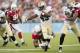 CANTON, OH - AUGUST 5: Linebacker Daryl Washington #58 of the Arizona Cardinals tackles running back Darren Sproles #43 of the New Orleans Saints during first quarter of the Pro Football Hall of Fame game at Fawcett Stadium on August 5, 2012 in Canton, Ohio. (Photo by Jason Miller/Getty Images)