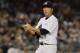 NEW YORK, NY - AUGUST 14: Hiroki Kuroda #18 of the New York Yankees looks on during the game against the Texas Rangers at Yankee Stadium on August 14, 2012 in the Bronx borough of New York City. (Photo by Mike Stobe/Getty Images)