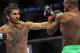 June 8, 2012; Sunrise, FL, USA; Demetrious Johnson (right) fights against Ian McCall (left) during their UFC bout at BankAtlantic Center. Mandatory Credit: Steve Mitchell-US PRESSWIRE