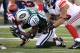 EAST RUTHERFORD, NJ - DECEMBER 24: Michael Boley #59 of the New York Giants tackles Santonio Holmes #10 of the New York Jets during the second half on December 24, 2011 at MetLife Stadium in East Rutherford, New Jersey. (Photo by Christopher Pasatieri/Getty Images)