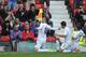 Chris Wood emmulates Wayne Rooney at the Stretford End.