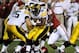 Dec 30, 2011; Tempe, AZ, USA; Oklahoma Sooners defensive back Tony Jefferson (12) tackles Iowa Hawkeyes fullback Brad Rogers (38) during the first half of the 2011 Insight Bowl at the Sun Devil Stadium. Mandatory Credit: Richard Mackson-US PRESSWIRE