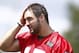 CORTLAND, NY - JULY 27: Tim Tebow #15 of the New York Jets walks off the field after Jets Training Camp at SUNY Cortland on July 27, 2012 in Cortland, New York. (Photo by Jeff Zelevansky/Getty Images)