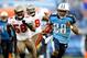 NASHVILLE, TN - NOVEMBER 27: Chris Johnson #28 of the Tennessee Titans breaks away from Quincy Black #58 and John McCargo #79 of the Tampa Bay Buccaneers for a long gain during play at LP Field on November 27, 2011 in Nashville, Tennessee. The Titans won 23-17. (Photo by Grant Halverson/Getty Images)