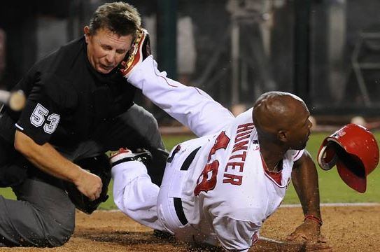 Umpire Gibson Exits After Freak Play at the Plate