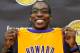 EL SEGUNDO, CA - AUGUST 10: Dwight Howard poses with his new Los Angeles Lakers jersey after being introduced to the media as the newest member of the Lakers during a news conference at the Toyota Sports Center on August 10, 2012 in El Segundo, California. The Lakers aquired Howard from Orlando Magic in a four-team trade. In addition Lakers wil receive Chris Duhon and Earl Clark from the Magic. (Photo by Kevork Djansezian/Getty Images)