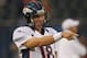 CHICAGO, IL - AUGUST 09: Peyton Manning #18 of the Denver Broncos participates in warm-ups before a preseason game against the Chicago Bears at Soldier Field on August 9, 2012 in Chicago, Illinois. (Photo by Jonathan Daniel/Getty Images)