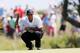 KIAWAH ISLAND, SC - AUGUST 11: Tiger Woods of the United States lines up a putt on the second green during Round Three of the 94th PGA Championship at the Ocean Course on August 11, 2012 in Kiawah Island, South Carolina. (Photo by Sam Greenwood/Getty Images)
