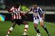 HEERENVEEN, NETHERLANDS - MARCH 21: Oussama Assaidi of Heerenveen and Atiba Hutchinson of PSV battle for the ball during the Dutch Cup Semi Final between SC Heerenveen and PSV Eindhoven at Abe Lenstra Stadion on March 21, 2012 in Heerenveen, Netherlands. (Photo by Dean Mouhtaropoulos/Getty Images)