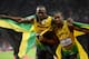 LONDON, ENGLAND - AUGUST 05: Gold medalist Usain Bolt of Jamaica (L) celebrates with silver medalist Yohan Blake of Jamaica (R) after winning the Men's 100m Final on Day 9 of the London 2012 Olympic Games at the Olympic Stadium on August 5, 2012 in London, England. (Photo by Julia Vynokurova/Getty Images)