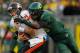 EUGENE, OR - NOVEMBER 26: Dion Jordan #96 of the Oregon Ducks tries to sackes quarterback Sean Mannion #4 of the Oregon State Beavers during the 115th Civil War on November 26, 2011 at the Autzen Stadium in Eugene, Oregon. (Photo by Jonathan Ferrey/Getty Images)