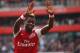 LONDON, ENGLAND - SEPTEMBER 24: Alex Song of Arsenal celebrates his goal with team mate Bacary Sagna during the Barclays Premier League match between Arsenal and Bolton Wanderers at Emirates Stadium on September 24, 2011 in London, England. (Photo by Clive Mason/Getty Images)