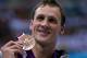 LONDON, ENGLAND - AUGUST 02: Bronze medallist Ryan Lochte of the United States poses with his medal following during the medal ceremony for the Men's 200m Backstroke final on Day 6 of the London 2012 Olympic Games at the Aquatics Centre on August 2, 2012 in London, England. (Photo by Ezra Shaw/Getty Images)
