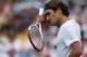 MASON, OH - AUGUST 16: Roger Federer of Switzerland wipes sweat from his forehead against Bernard Tomic of Australia during day six of the Western & Southern Open at Lindner Family Tennis Center on August 16, 2012 in Mason, Ohio. (Photo by Nick Laham/Getty Images)