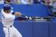 TORONTO, CANADA - JULY 5: J.P. Arencibia #9 of the Toronto Blue Jays hits a third inning home run during MLB game action against the Kansas City Royals July 5, 2012 at Rogers Centre in Toronto, Ontario, Canada. (Photo by Brad White/Getty Images)