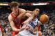 PHILADELPHIA, PA - MAY 10: Omer Asik #3 of the Chicago Bulls and Evan Turner #12 of the Philadelphia 76ers battle for the ball in Game Six of the Eastern Conference Quarterfinals in the 2012 NBA Playoffs at the Wells Fargo Center on May 10, 2012 in Philadelphia, Pennsylvania. NOTE TO USER: User expressly acknowledges and agrees that, by downloading and or using this photograph, User is consenting to the terms and conditions of the Getty Images License Agreement. (Photo by Drew Hallowell/Getty Images)